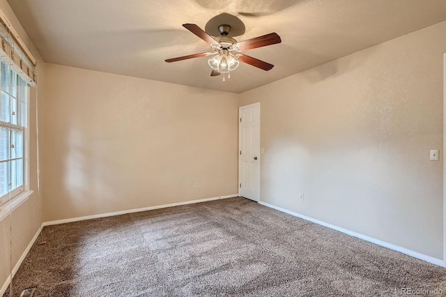 3540 E 5th Ave, Denver, CO 80206 - spare room with carpet, a ceiling fan, and baseboards