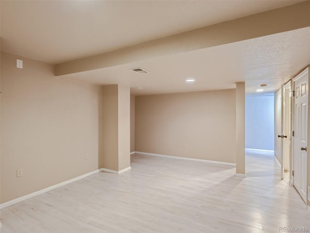 3540 E 5th Ave, Denver, CO 80206 - finished below grade area with light wood-type flooring, baseboards, and recessed lighting