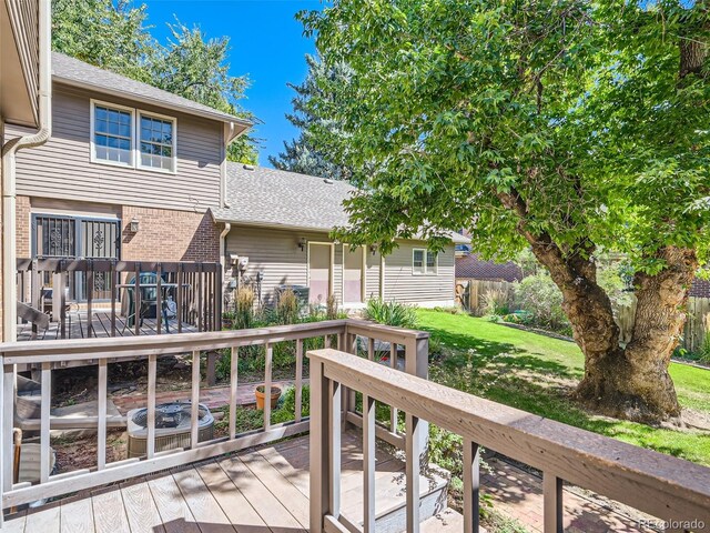 3540 E 5th Ave, Denver, CO 80206 - wooden deck with a lawn and central air condition unit