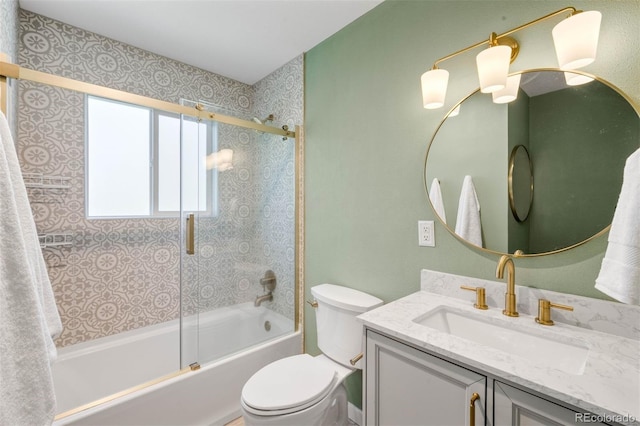 full bathroom with vanity, toilet, and bathing tub / shower combination