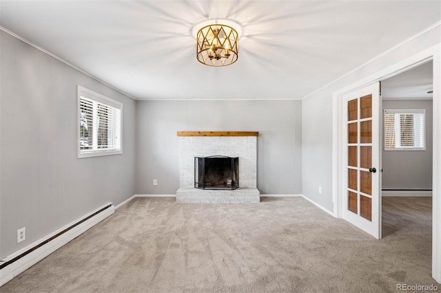 unfurnished living room with a fireplace, crown molding, baseboard heating, and carpet