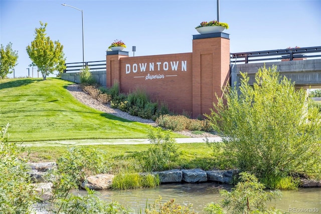 community sign with fence