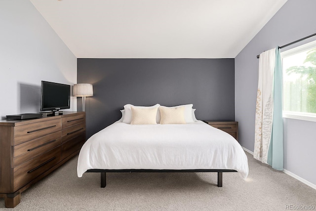 2634 E 132nd Ave, Thornton, CO 80241 - bedroom featuring vaulted ceiling and light carpet