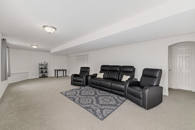 2634 E 132nd Ave, Thornton, CO 80241 - carpeted living area with baseboards and arched walkways