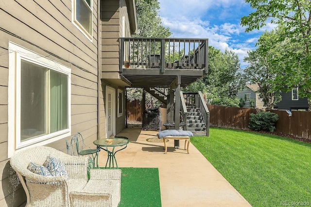2634 E 132nd Ave, Thornton, CO 80241 - fenced backyard with stairs, a patio area, and a wooden deck