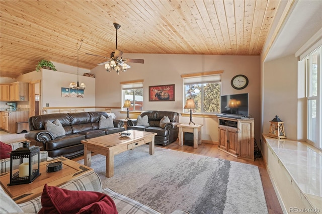 1948 Wagon Wheel Rd, Hartsel, CO 80449 - living room with wooden ceiling, vaulted ceiling, light wood finished floors, a ceiling fan, and a chandelier