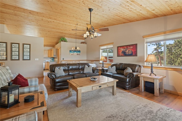1948 Wagon Wheel Rd, Hartsel, CO 80449 - living area featuring wood ceiling, a ceiling fan, wood finished floors, lofted ceiling, and a chandelier