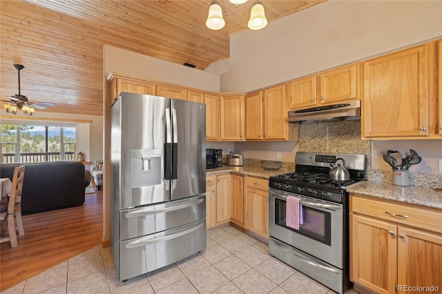 1948 Wagon Wheel Rd, Hartsel, CO 80449 - kitchen featuring stainless steel appliances, under cabinet range hood, wood ceiling, high vaulted ceiling, and light tile patterned flooring