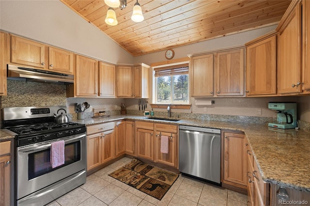 1948 Wagon Wheel Rd, Hartsel, CO 80449 - kitchen with stainless steel appliances, under cabinet range hood, wood ceiling, vaulted ceiling, and light tile patterned floors