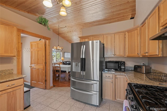 1948 Wagon Wheel Rd, Hartsel, CO 80449 - kitchen with stainless steel fridge, black microwave, range with gas cooktop, wood ceiling, and light tile patterned floors