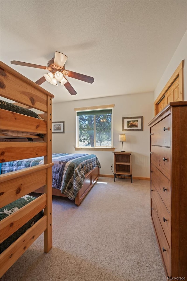 1948 Wagon Wheel Rd, Hartsel, CO 80449 - bedroom with light colored carpet and a ceiling fan