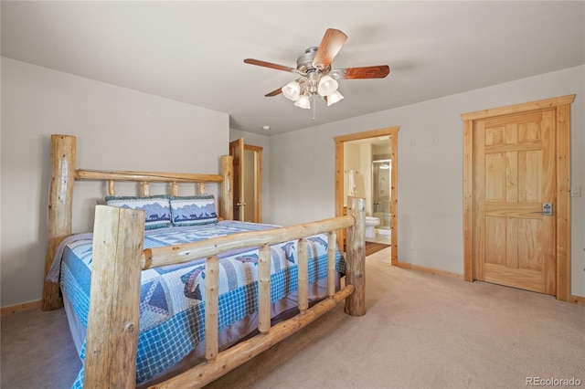 1948 Wagon Wheel Rd, Hartsel, CO 80449 - carpeted bedroom with ensuite bathroom and a ceiling fan