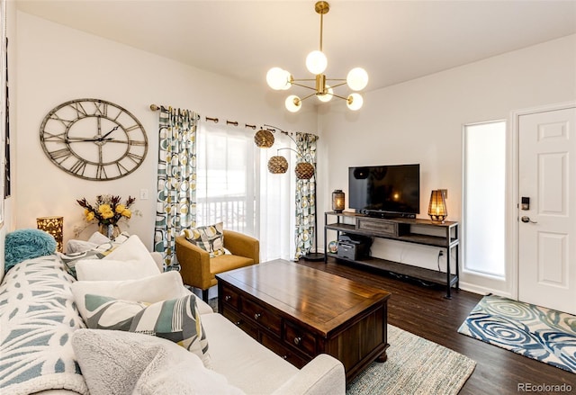 5439 S Dover St Unit 101, Littleton, CO 80123 - living area featuring wood finished floors and a chandelier