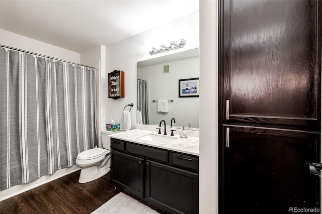 5439 S Dover St Unit 101, Littleton, CO 80123 - full bathroom featuring wood finished floors and vanity