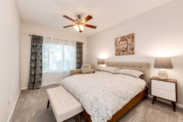5439 S Dover St Unit 101, Littleton, CO 80123 - carpeted bedroom featuring baseboards and a ceiling fan