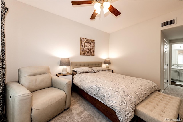 5439 S Dover St Unit 101, Littleton, CO 80123 - bedroom featuring carpet flooring, a ceiling fan, and connected bathroom