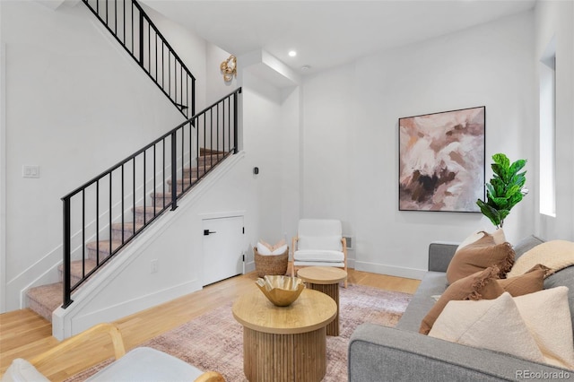 1250 Yates St, Denver, CO 80204 - living area featuring wood finished floors, stairway, and recessed lighting