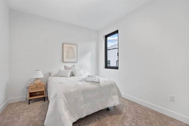1250 Yates St, Denver, CO 80204 - carpeted bedroom featuring baseboards