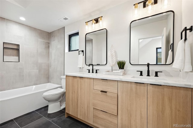 1735 Lowell Blvd, Denver, CO 80204 - full bathroom featuring a sink, tile patterned floors, toilet, and visible vents