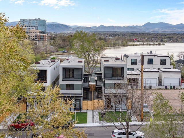 1735 Lowell Blvd, Denver, CO 80204 - exterior space with stucco siding and a mountain view