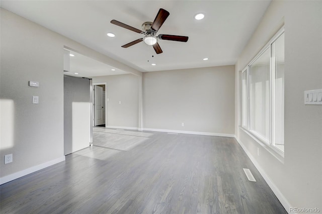 unfurnished room featuring recessed lighting, baseboards, a ceiling fan, and wood finished floors