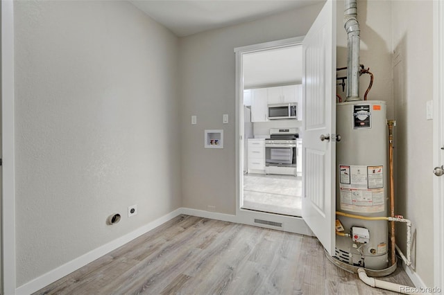 utilities featuring visible vents and water heater