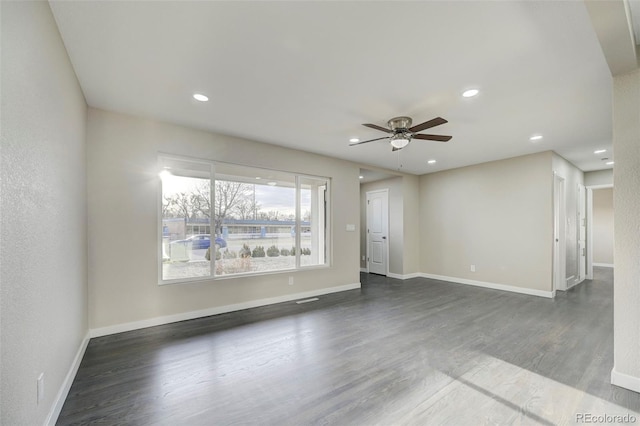 empty room featuring wood finished floors, ceiling fan, baseboards, and recessed lighting