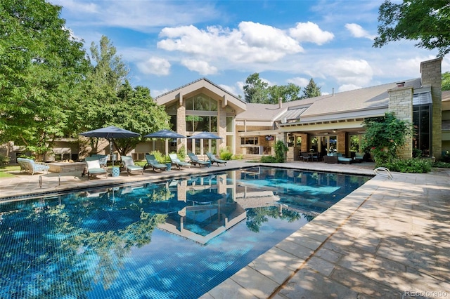 4766 S Fillmore Ct, Cherry Hills Village, CO 80113 - swimming pool featuring a patio area
