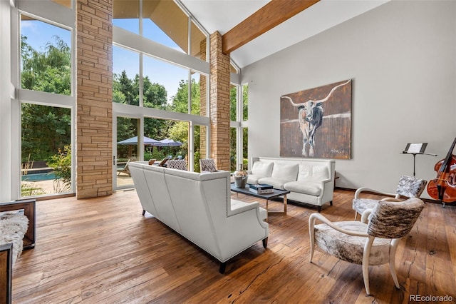 4766 S Fillmore Ct, Cherry Hills Village, CO 80113 - living room with high vaulted ceiling, wood-type flooring, and beam ceiling