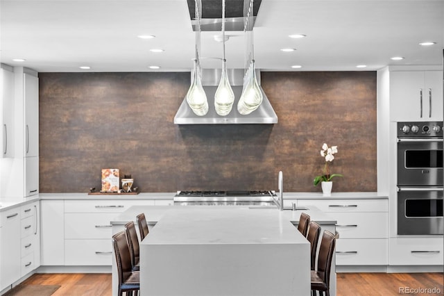 4766 S Fillmore Ct, Cherry Hills Village, CO 80113 - dining space featuring light wood-type flooring and recessed lighting