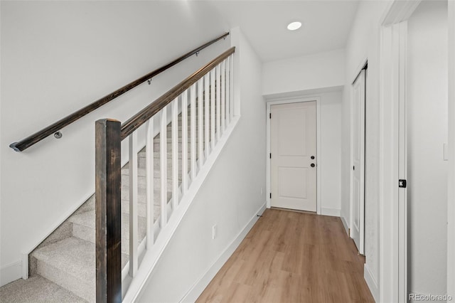 2736 W 68th Ave, Denver, CO 80221 - stairway featuring wood finished floors and baseboards