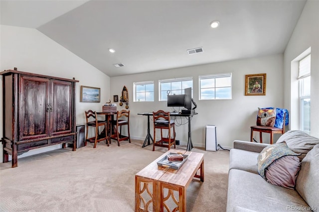 living room with light colored carpet, lofted ceiling, recessed lighting, and baseboards