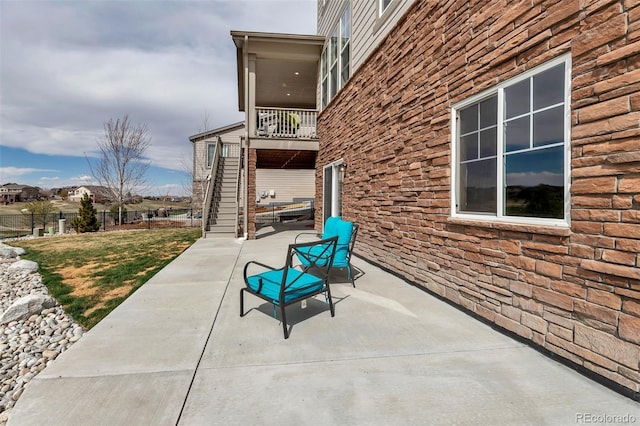 view of patio with stairway