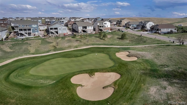 aerial perspective of suburban area with a local golf course