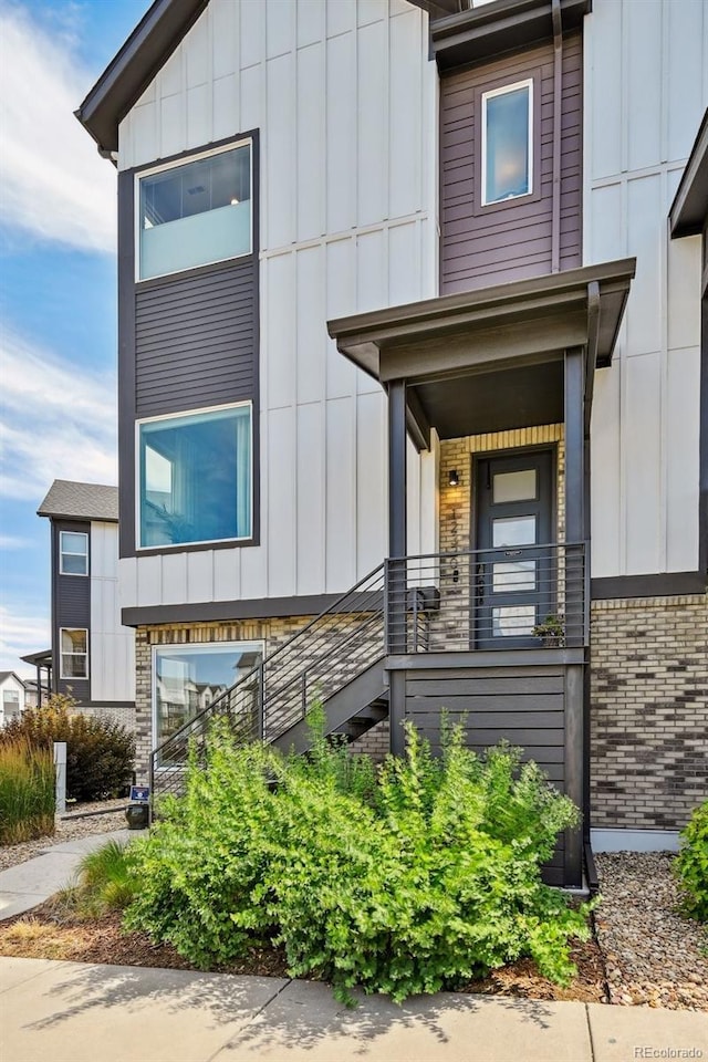 12320 W 51st Ave, Wheat Ridge, CO 80033 - contemporary house with board and batten siding and brick siding