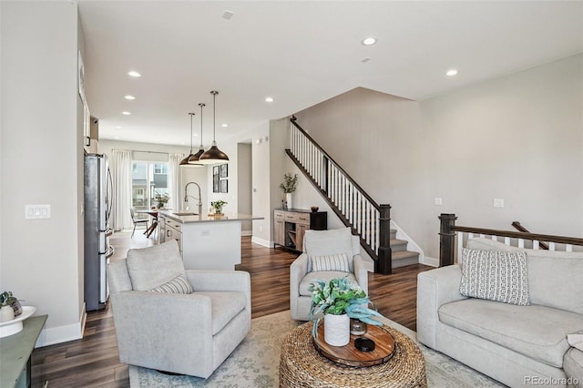 12320 W 51st Ave, Wheat Ridge, CO 80033 - living room featuring stairway, dark wood finished floors, and recessed lighting