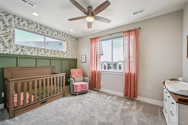 12320 W 51st Ave, Wheat Ridge, CO 80033 - bedroom with a crib, carpet, recessed lighting, ceiling fan, and wallpapered walls