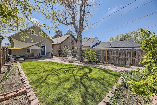 back of house featuring entry steps, stucco siding, and a patio area