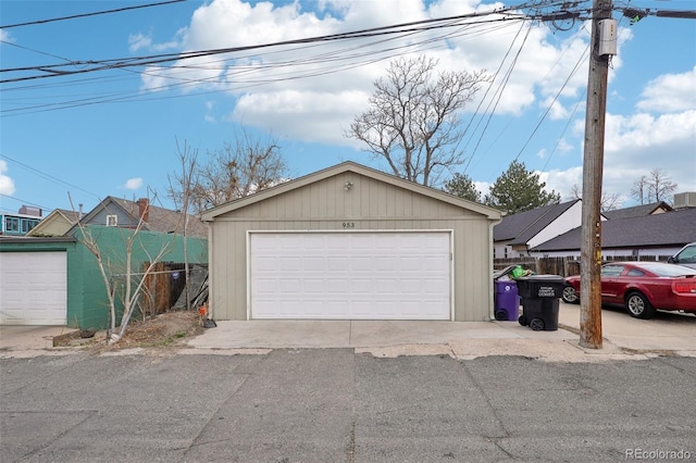 detached garage with fence