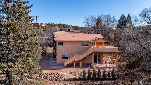 back of house featuring a patio