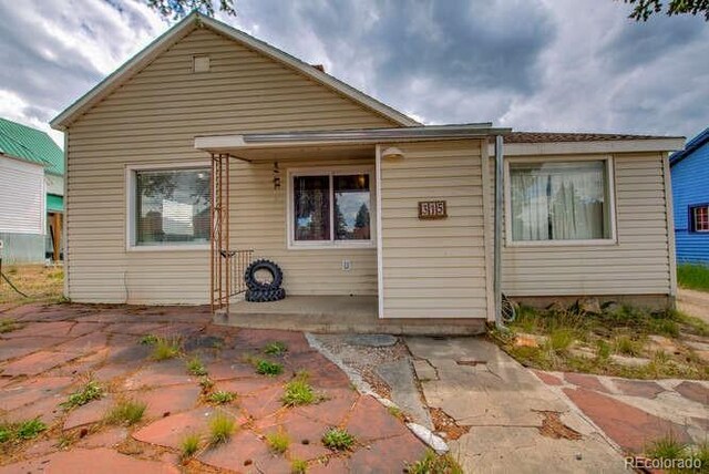 rear view of property with a patio