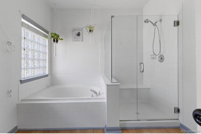 12277 W Chenango Dr, Morrison, CO 80465 - bathroom with a stall shower and a garden tub