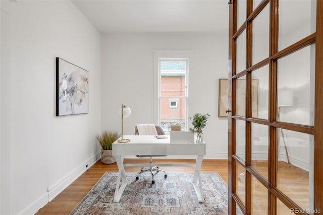 3905 Tejon St, Denver, CO 80211 - home office featuring light wood-type flooring and baseboards