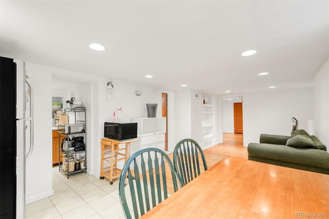 3905 Tejon St, Denver, CO 80211 - dining room with recessed lighting, light tile patterned flooring, and baseboards