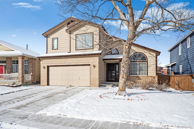 front of property with a garage