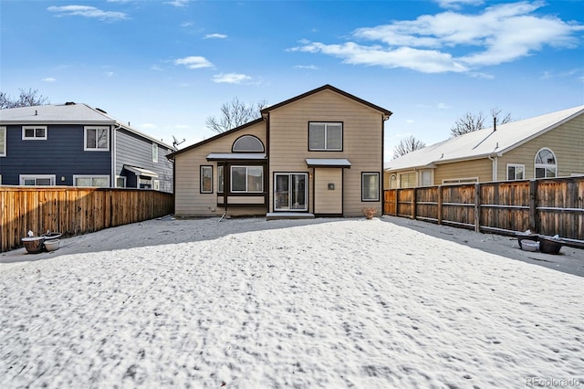 view of snow covered property