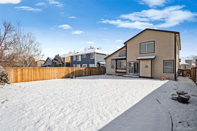 view of snow covered property