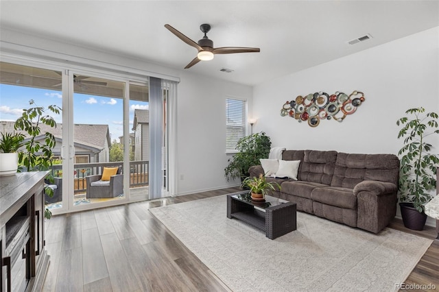 9628 Albion Ln, Thornton, CO 80229 - living area with a ceiling fan and wood finished floors