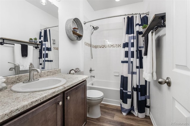 9628 Albion Ln, Thornton, CO 80229 - full bath with vanity, shower / bathtub combination with curtain, and wood finished floors