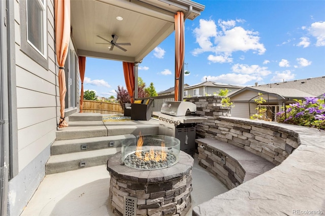 9628 Albion Ln, Thornton, CO 80229 - view of patio with an outdoor fire pit, a ceiling fan, and area for grilling